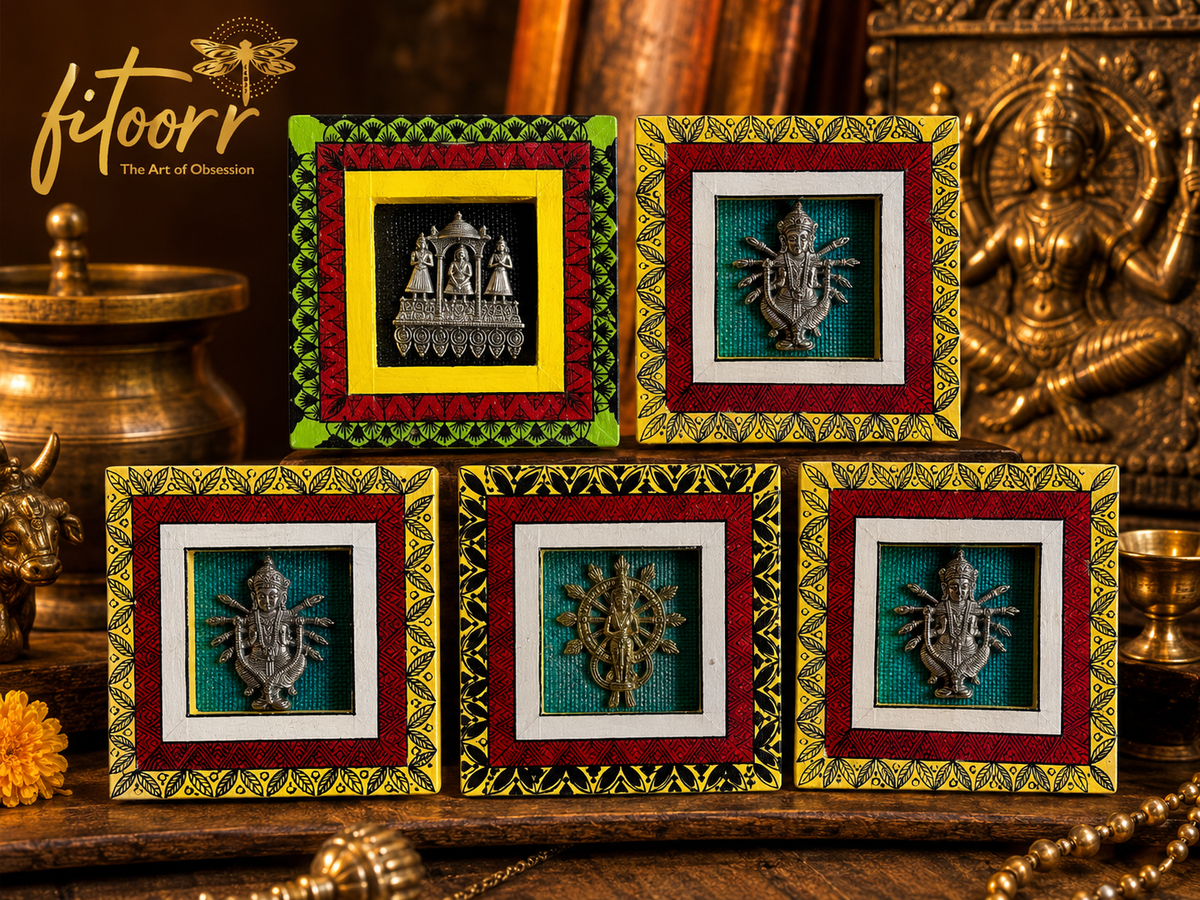 Alt text: Fitoorr handcrafted Dokhra wall art collection featuring colourful hand-painted frames with traditional Indian metal figures and cultural motifs.
