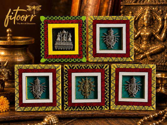 Alt text: Fitoorr handcrafted Dokhra wall art collection featuring colourful hand-painted frames with traditional Indian metal figures and cultural motifs.